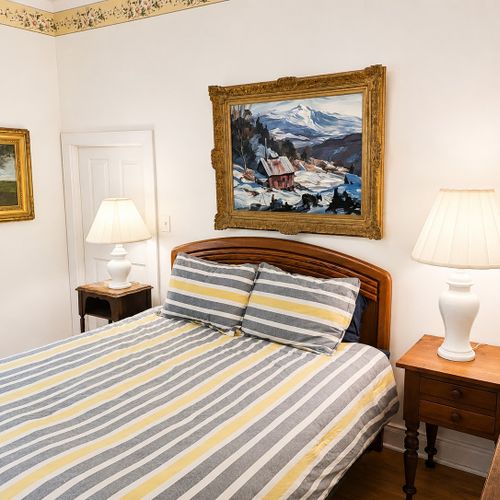 BEDROOM #1 (FIRST FLOOR):  Convenient bedroom on the main floor with a queen-size bed.