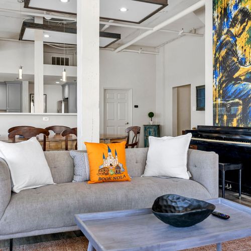 Cozy sofa corner with a piano for music lovers