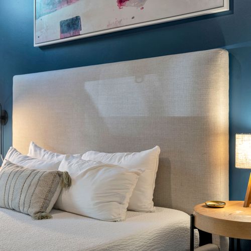 Tall upholstered headboard for lounging in bed