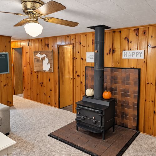 OVERVIEW:  The home has a comfy and relaxing living room with a sofa, chair coffee table, and television.  (Note that the wood fireplace in the living room is not available for guest usage.)