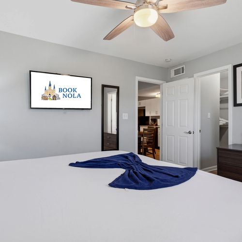King bedroom w/ smart TV for cozy nights in.