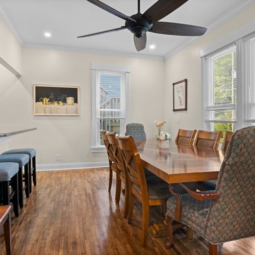 DINING ROOM - HOUSE: The house has a lovely dining room with seating for 8 adults. The dining room is between the kitchen and the living room