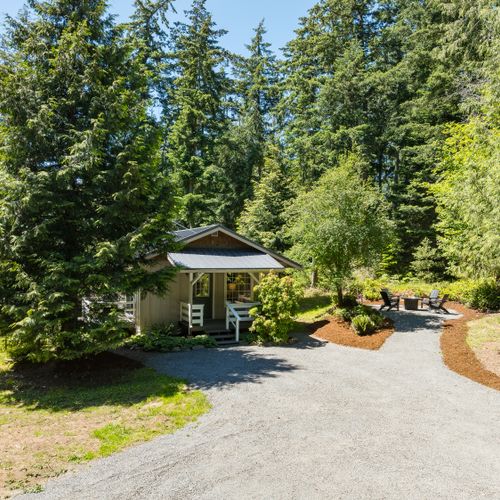 Tucked among the trees, this peaceful cottage offers privacy, nature, and room to unwind
