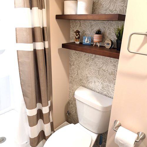 BATHROOM #2 (LOWER LEVEL):  Full bathroom on the lower level.  Just like the main floor bathroom, it features a relaxing rain shower!