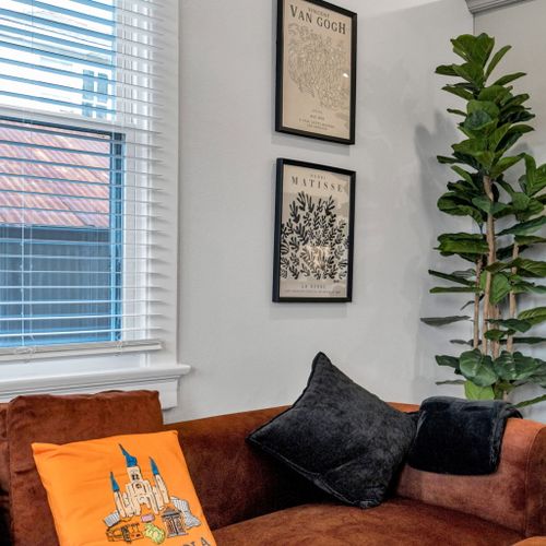 Cozy up w/ throw pillows in the sunny sitting area by the window