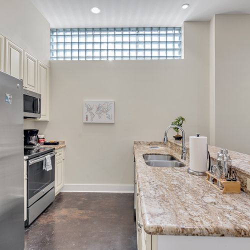 Galley kitchen with clerestory windows