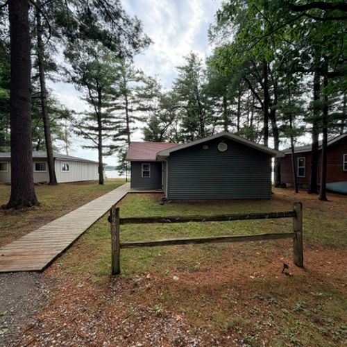 EXTERIOR:  The front entrance and parking area.