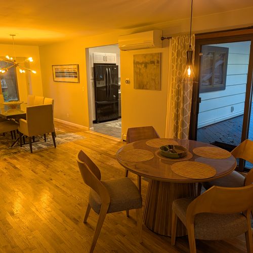 DINING AREA (SECOND FLOOR):  Features both a formal dining table with seating for 8 adults and a breakfast or card table with seating for 4 adults.