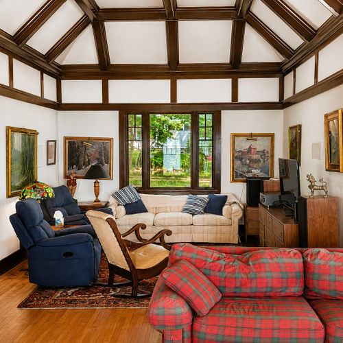 LIVING ROOM:  The home has a huge and very comfy and family-friendly living room with a large wood fireplace.