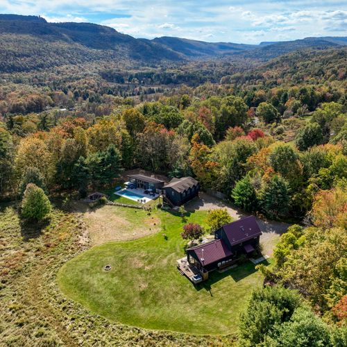5 acres of property, surrounded by meadows, mature trees and the Shawangunk mountain range.
