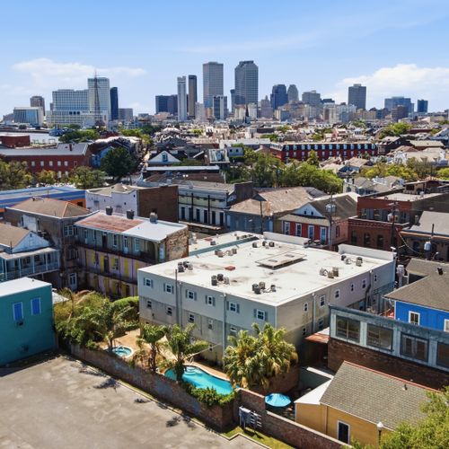 Wide aerial capturing the city skyline from your New Orleans neighborhood.