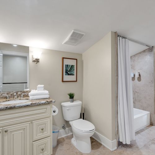 Clean, classic full bath with tub