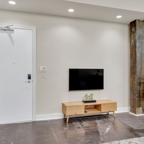 Keyless entry and a sleek Smart TV to greet you