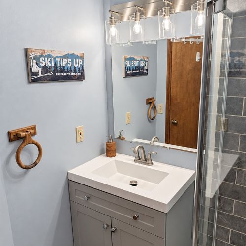 BATHROOM #2 (FIRST FLOOR):  Full bathroom on the first floor with a walk-in shower.