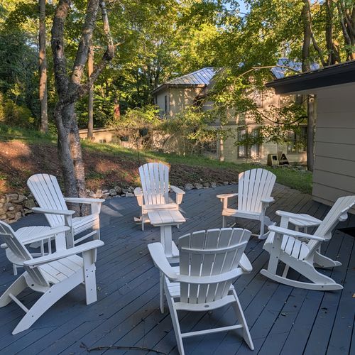 EXTERIOR:  The Adirondack chair on the deck at The Birches by the Lake