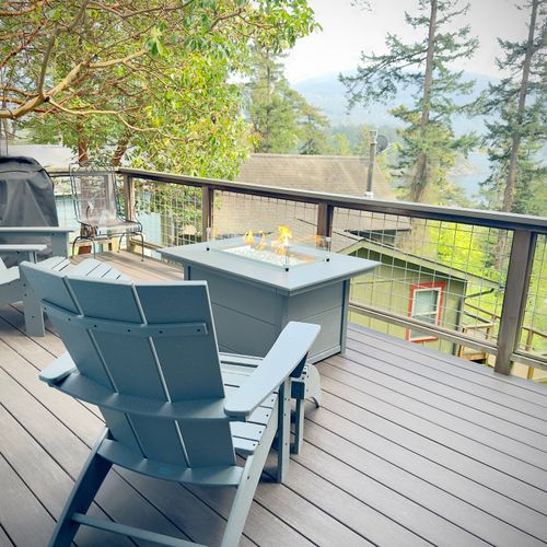 Enjoy the outdoors with a gas firepit and water views.
