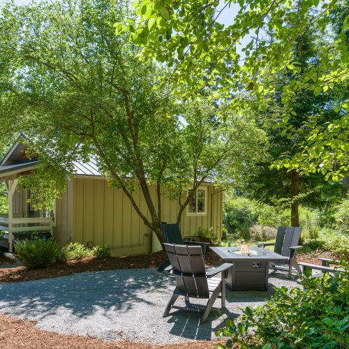 Gather around the fire pit and unwind in a peaceful woodland setting
