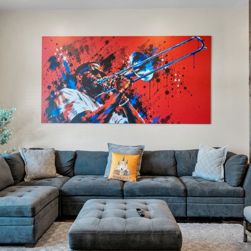 Sink into the sectional under gallery-sized art