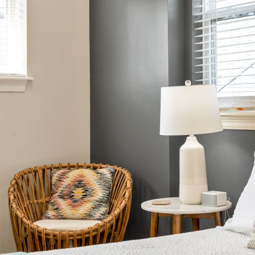 Woven chair and lamp for a quiet reading spot