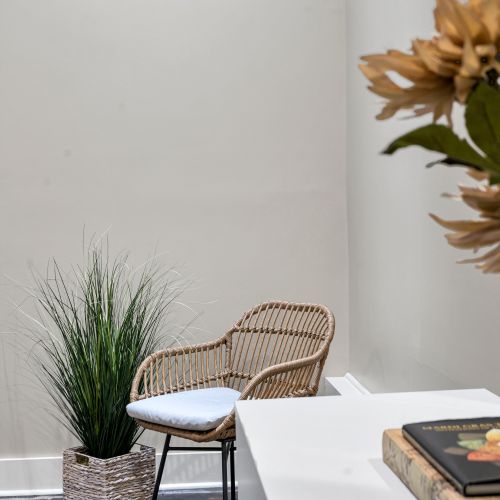 Wicker chair corner for a quiet pause