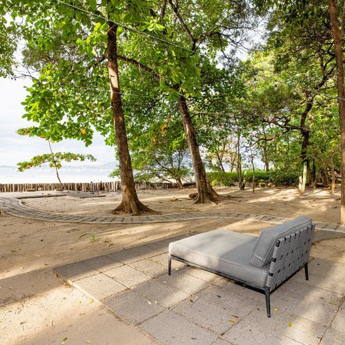 Enjoy sunsets and beach time on the patio right on the beach