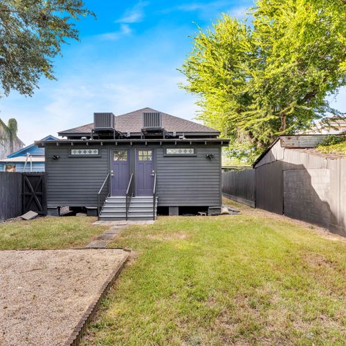 Charming home w/ a fully fenced yard & open green space to stretch out & relax
