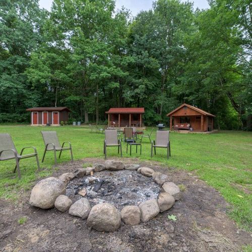 EXTERIOR:  The fun and family-friendly outdoor bonfire ring.