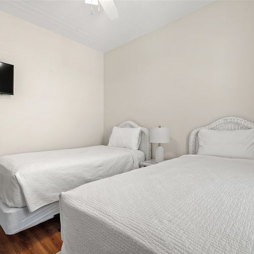 2nd floor room with 2 twins, smart tv and shared bathroom