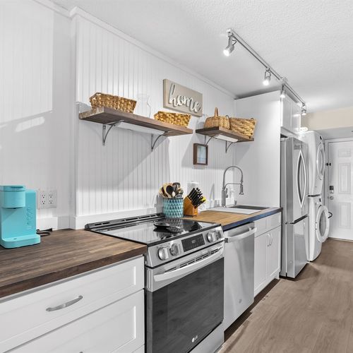 Kitchen Area stocked with all the cooking utensils you should need
