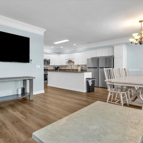 View from Living Room into Kitchen and Dining Are