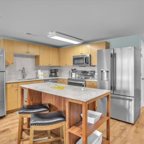 Kitchen with two full size refrigerators