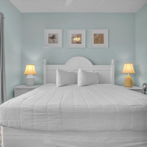 King bed with balcony view