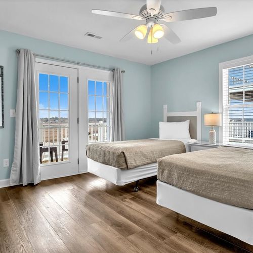 Second Floor Bedroom with 2 Twin Beds and Balcony View