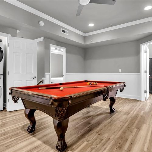 Game Room with Stackable washer and dryer in closet