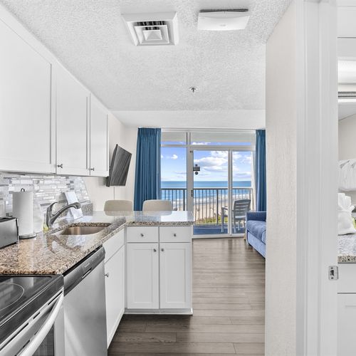 Fully stocked kitchen with view of Ocean