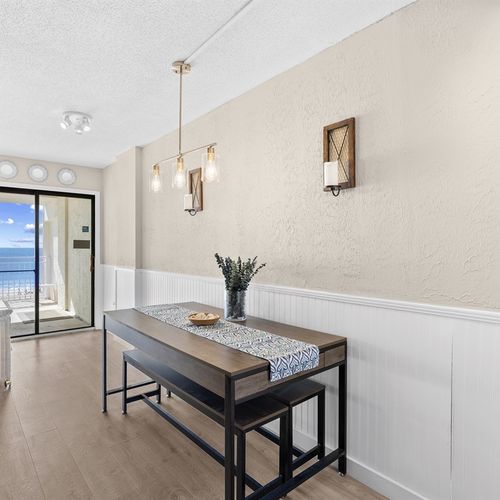 Dining Table and entrance to Ocean front Balcony