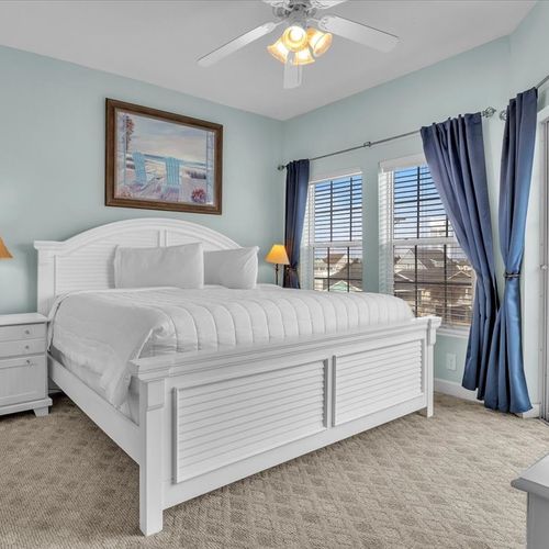 Primary Bedroom with balcony view