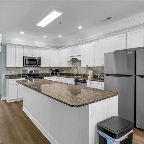 Kitchen with Large Island and 2 Full Size Refrigerators
