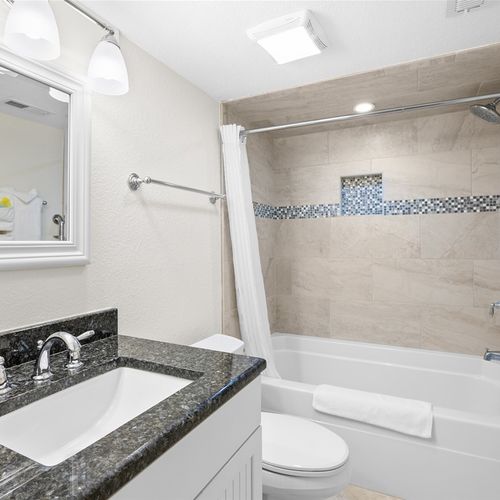 Shared Bathroom with Shower/Tub Combo