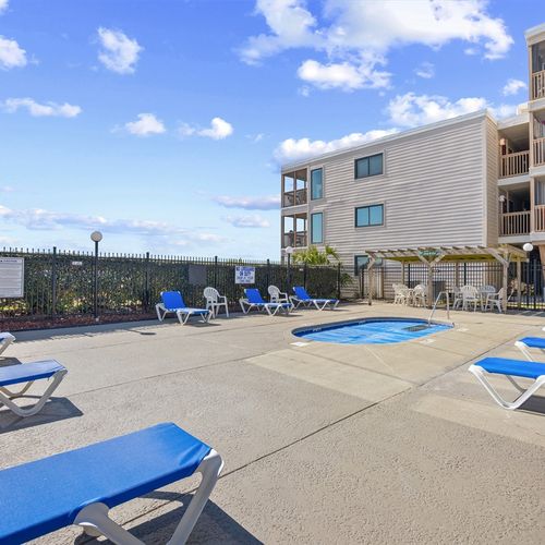 Outdoor Hot Tub with Lounge Chairs
