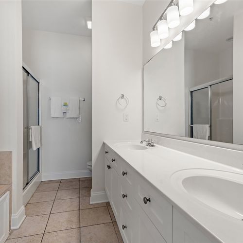Extra large full bath with double vanity, and separate shower and jacuzzi tub