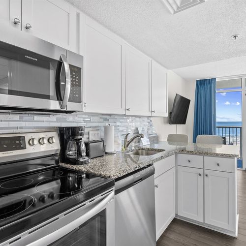 Fully stocked kitchen with view of Ocean