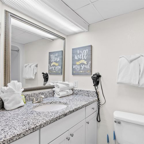Bathroom includes blow dryer and fresh clean linens
