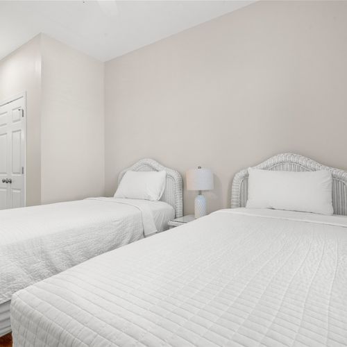 1st Floor Bedroom with 2 twin beds, shared bathroom