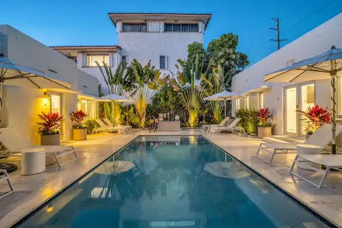 AcquaVilla pool courtyard at dusk, Miami Beach