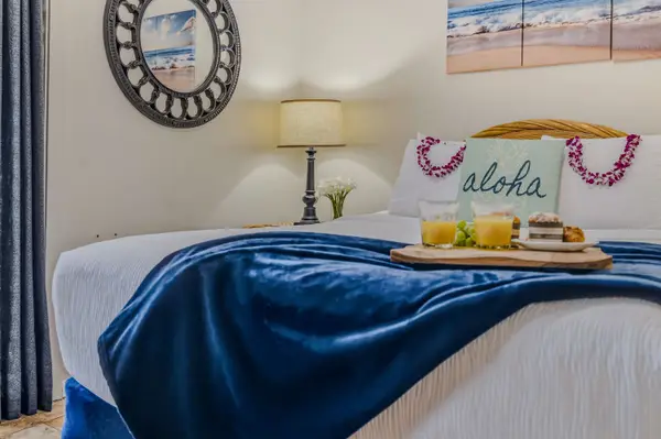 Cozy bedroom with a comfortable queen bed for restful nights.