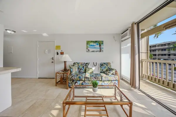 Unwind in an Open Living Room with Lanai Access