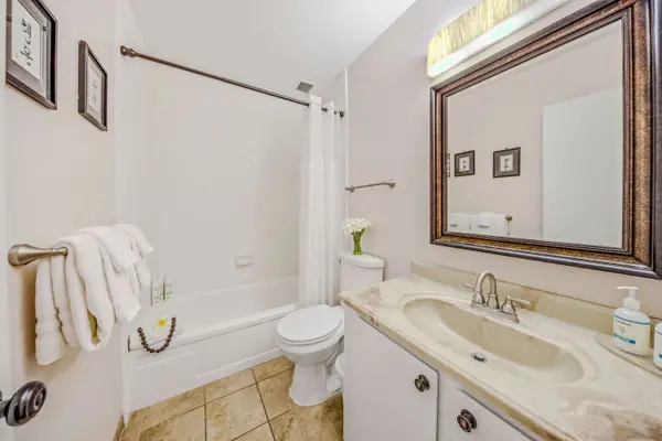 Clean, Modern Guest Bathroom Packed With Fresh Amenities
