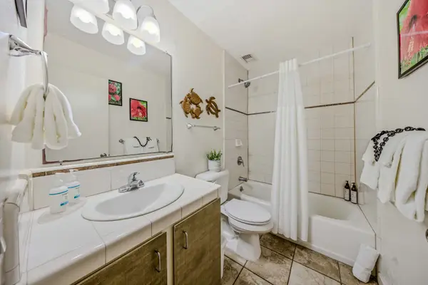 Clean, Modern Bathroom Vanity Packed With Amenities