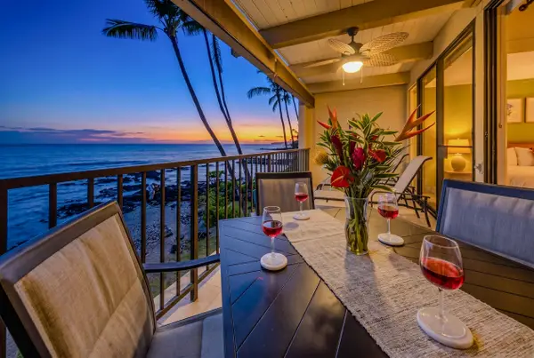 Sip A Drink As The Sun Sets Over The Ocean